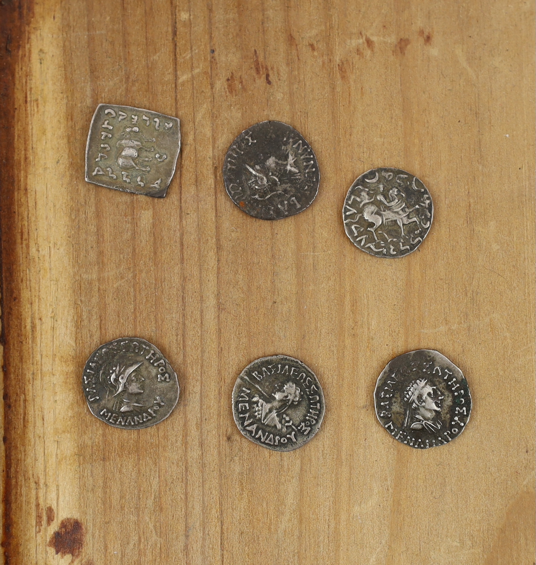 Bactrian and Indo-Greek Kingdom coins, Apollodotos I (180-160 BC) square drachm, 2.4g, Menander (155-130BC), four drachm, 2.3 and 2.46g, Antimachus II drachm (174-165BC) (6) together with various Indian copper coins, inc